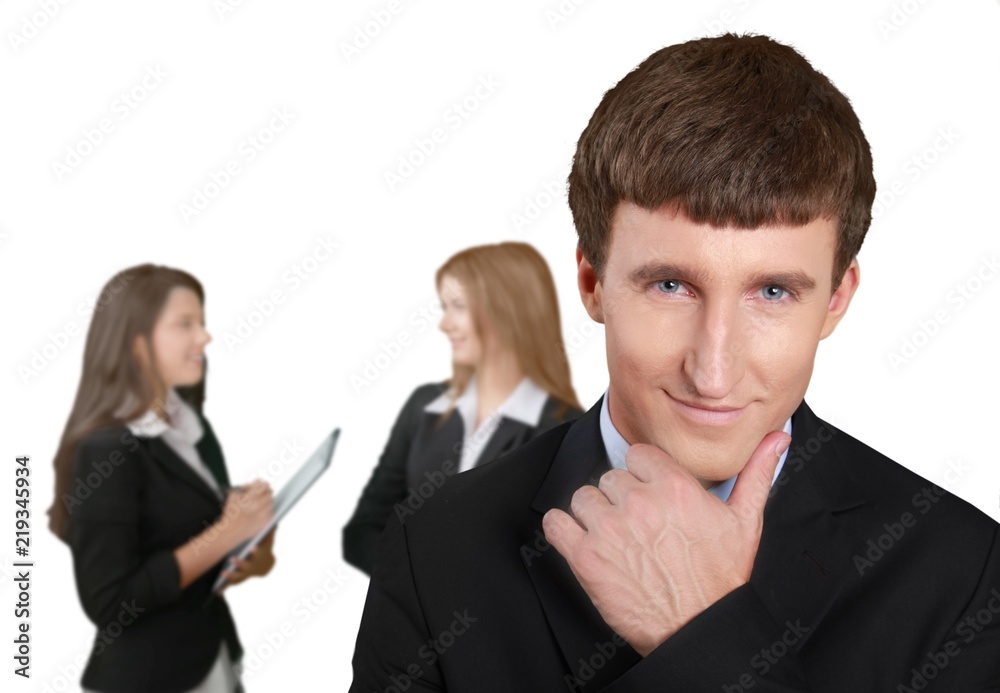 Young businessman and women working together in office isolated Young businessman and women working together in office isolated