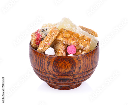 sweet candy comfit (Kanom chan up-Thai text) in wooden bowl