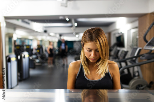 serious girl in a fitness club