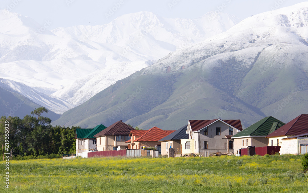 Fototapeta premium mountains and houses from afar