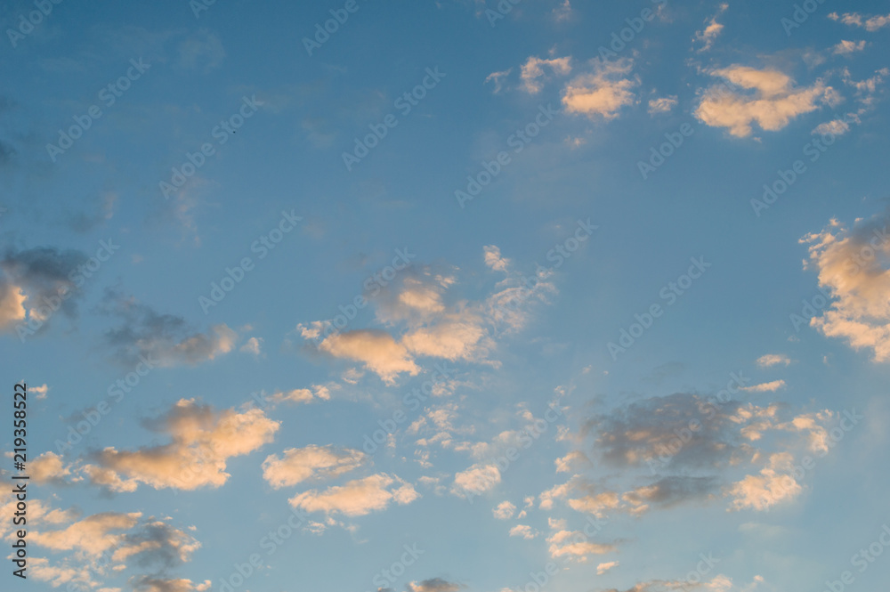 Beautiful blue sky with white clouds illuminated by the sun Beautiful blue sky with white clouds illuminated by the sun