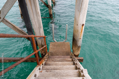 A jetty staircase leading down to the water at Port Noarlunga South Australia on 23rd August 2018 © Darryl
