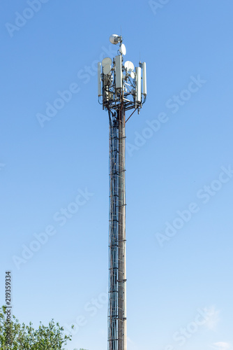 communication tower on blue sky background