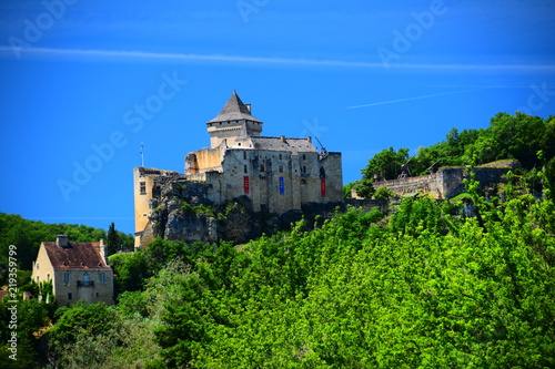 The fortress of Castelnaud-La-Chappelle, as seen from the Dordogne River in the Perigord region of France