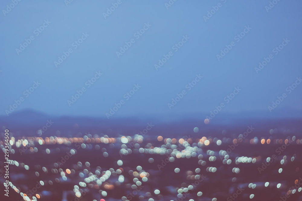 Naklejka premium Blur colorful bokeh light in night city view abstract background.