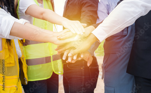 Teamwork working together joining concept multiethnic people group a meeting in the office for business cooperation.