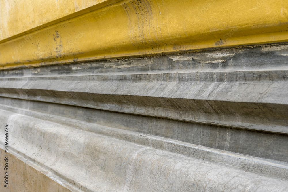 Detail of old walls of temple architecture of Thailand.