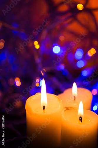 lit holiday candle © BillionPhotos.com