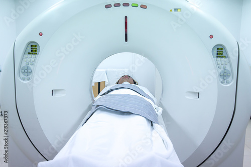 Process of CT scanning of an old patient. Man Receiving a Medical Scan for a Trauma