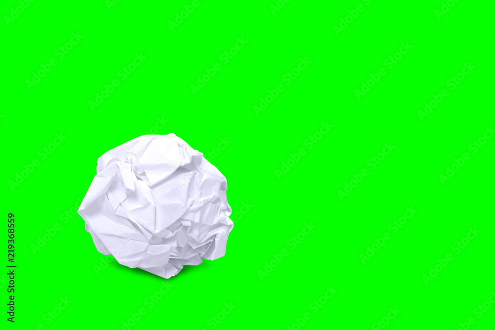 crumpled paper ball white on green screen background and copy space, rough paper ball isolated on green screen background, white paper ball waste on green screen stock for footage video