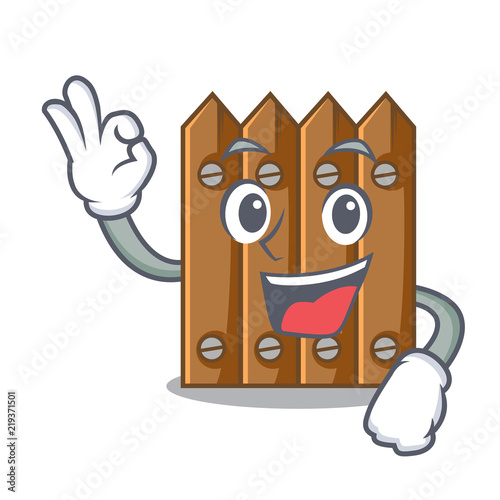 Okay character close up on wooden fence door