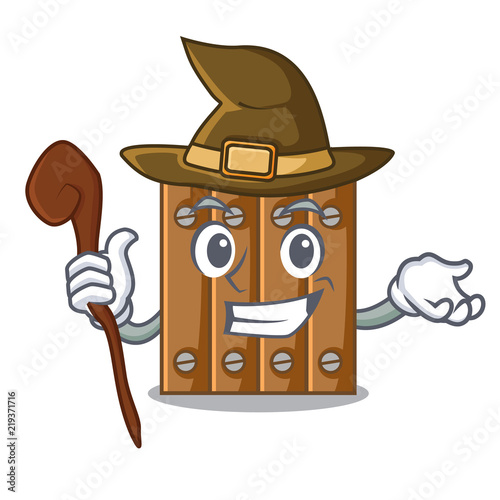 Witch cartoon wooden fence over the grass