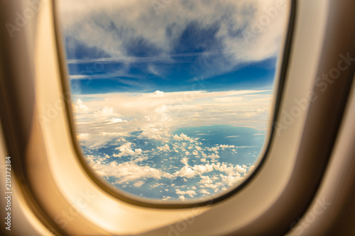 Aircraft window view for aerial transportation and travel concept.