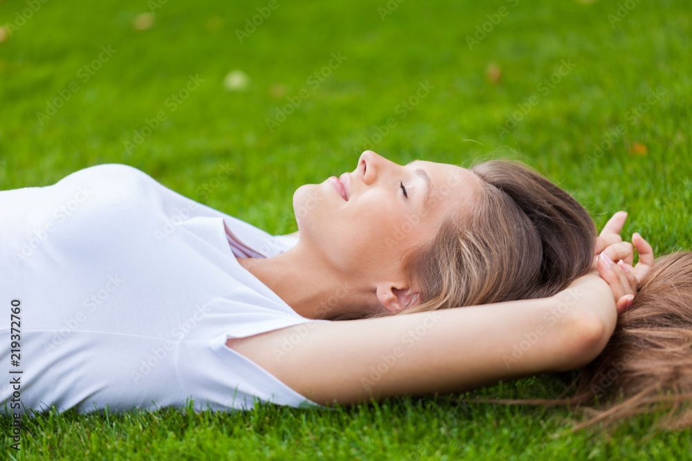 Portrait of a Young Woman Sleeping in a Park Portrait of a Young Woman Sleeping in a Park