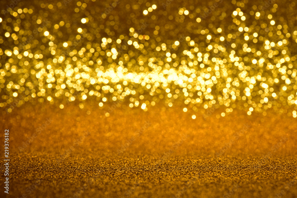 glitter gold vintage lights texture background. defocused