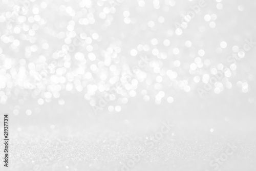 silver and white bokeh lights defocused. abstract background
