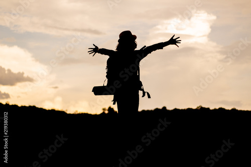 Young woman watching and Take a photo landscape,.backpacker. © thinnapat