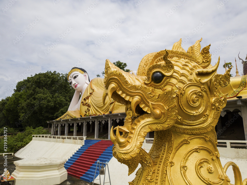 Aerial View of Buddhist Temple Wat Phra That Suthon Mongkon Khiri features beautiful architectures that are inspired by the ancient, traditional ordination hall (Ubosot) and reclining Buddha statue Aerial View of Buddhist Temple Wat Phra That Suthon Mongkon Khiri features beautiful architectures that are inspired by the ancient, traditional ordination hall (Ubosot) and reclining Buddha statue