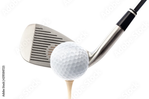 Closeup of Golf Club and Golf Ball on Tee