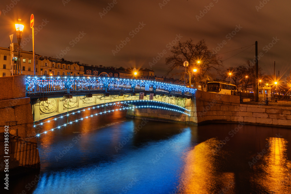 Fototapeta premium First Engineer Bridge over the Moyka River at night. Saint Petersburg, Russia