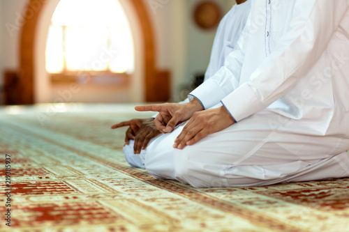 Fényképezés Two religious muslim man praying together inside the mosque