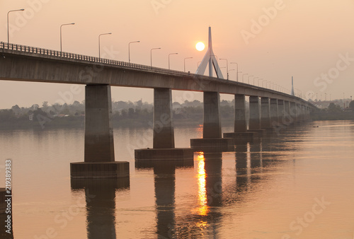 Bridge across the Mekong River. Thai-Lao friendship bridge on sunrise, Thailand. © alexzeer