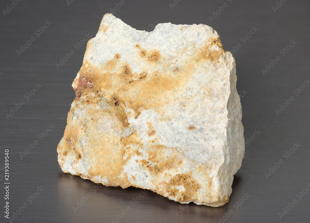Specimen of mineral stone corundum on gray background Specimen of mineral stone corundum on gray background