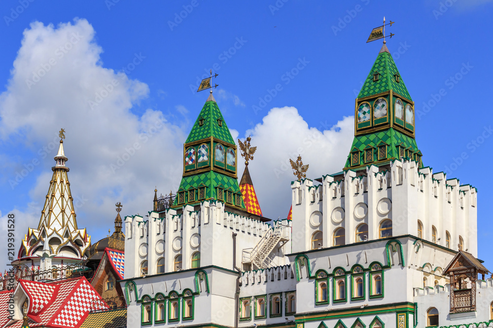 Towers of Izmailovo Kremlin against blue sky in Moscow