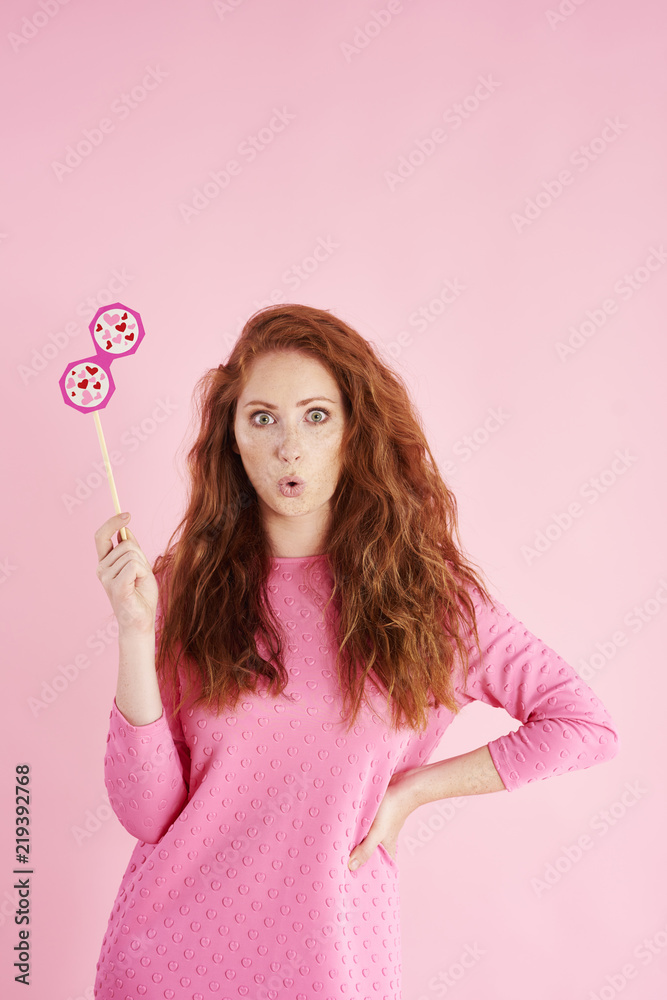 Portrait of surprised woman making a face at studio shot Portrait of surprised woman making a face at studio shot