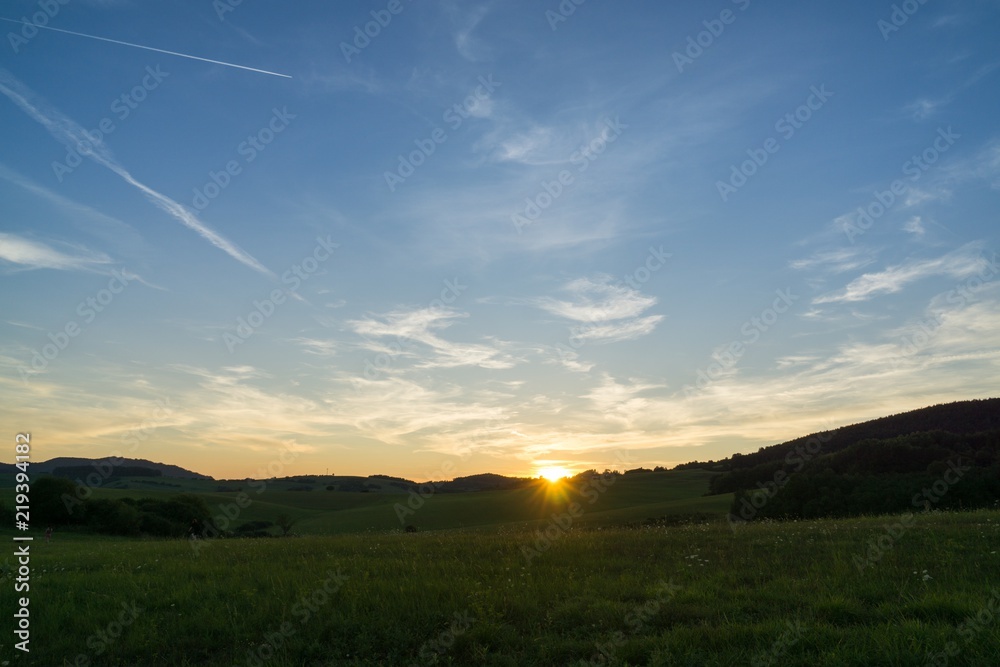 Sunrise and sunset over the hills and town. Slovakia