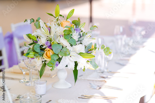 Beautiful fresh flowers table decoration in a restaurant for a special event