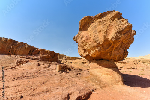 Mushroom shaped red rock in Timna national Valley  Israel. Travel nature landscape