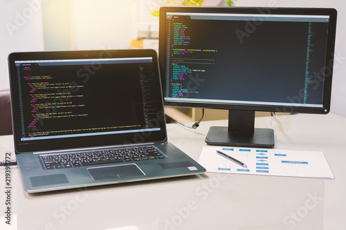 Developing programming and coding technologies on desk white, Website design, Programmer working in a software develop company office,Data processing center.