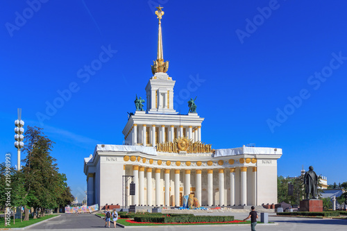 Square in front of the pavilion Central on Exhibition of Achievements of National Economy (VDNH) in Moscow on a sunny summer morning photo