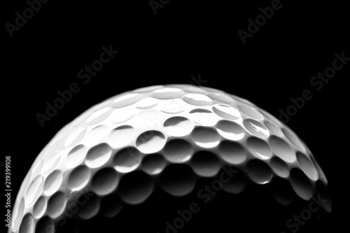 Close Up of Golf Ball, Isolated on Black Background