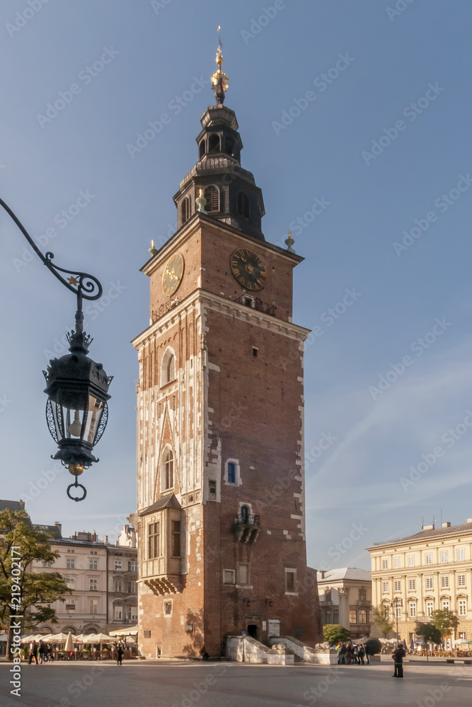 The town hall tower and the main market square in Krakow, Poland, on a beautiful sunny day