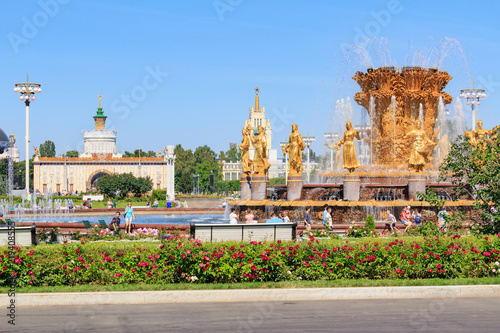 Fountain Friendship of peoples against pavilion Ukrainian SSR on Exhibition of Achievements of National Economy (VDNH) in Moscow on a sunny summer morning photo