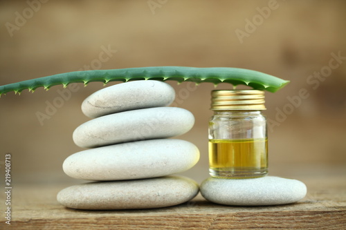 aloe oil spa therapy wood background