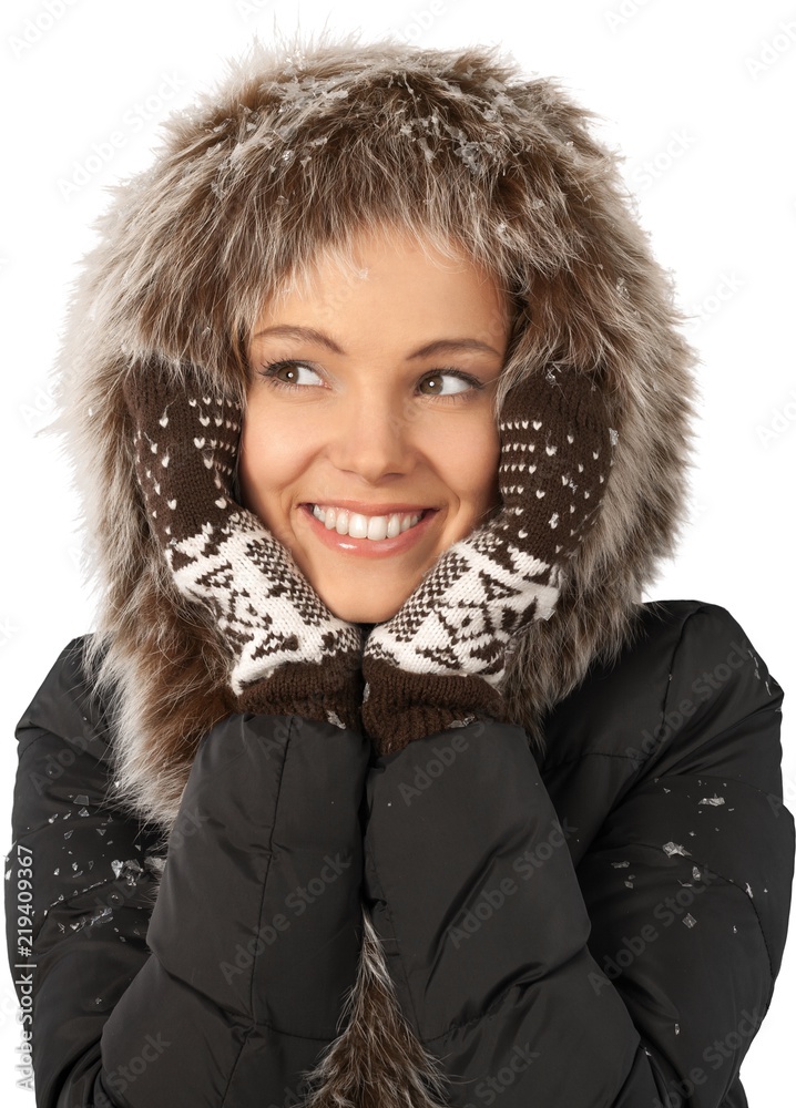 Pretty young woman in warm clothes isolated on white background Pretty young woman in warm clothes isolated on white background