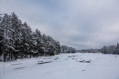 River and rapids of Koitelinkoski in Oulu, Finland. Winter scenery. © Jarmo V