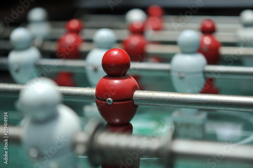 close up of Table football game, Soccer table with red and white players, selective focusing. 