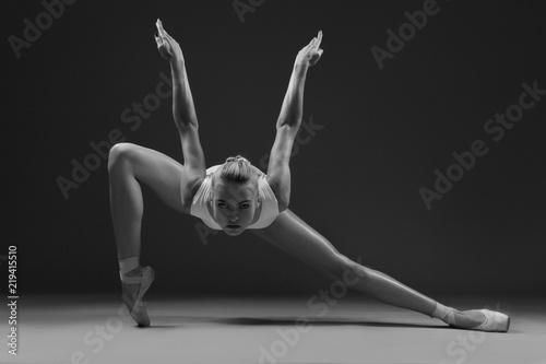 Ballerina like a predatory bird. Black and white photo.