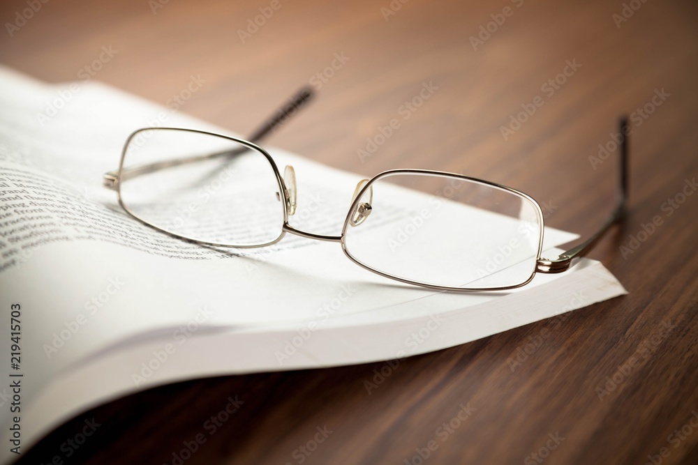Closeup of Reading Glasses on Book Closeup of Reading Glasses on Book