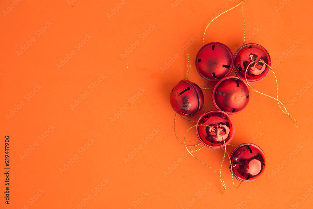 Christmas tree ornament jingle bells on colorful background