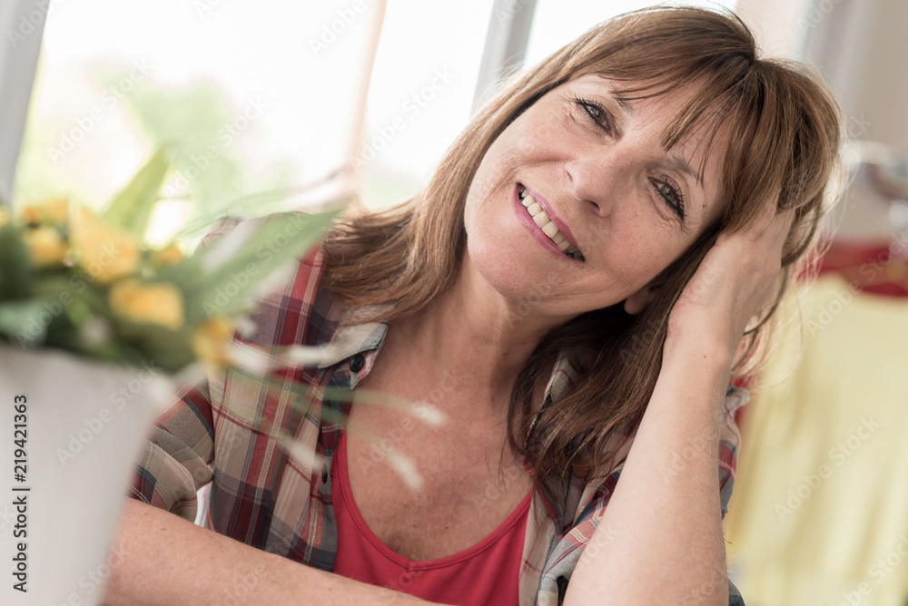 Fototapeta premium Portrait of smiling mature woman