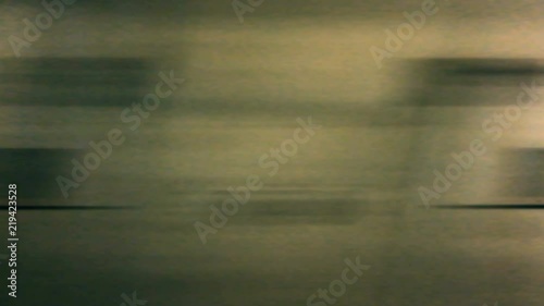 Uhd Footage :  Out side view of Underground train run through the tunnel . The tunnel wall and illuminate light