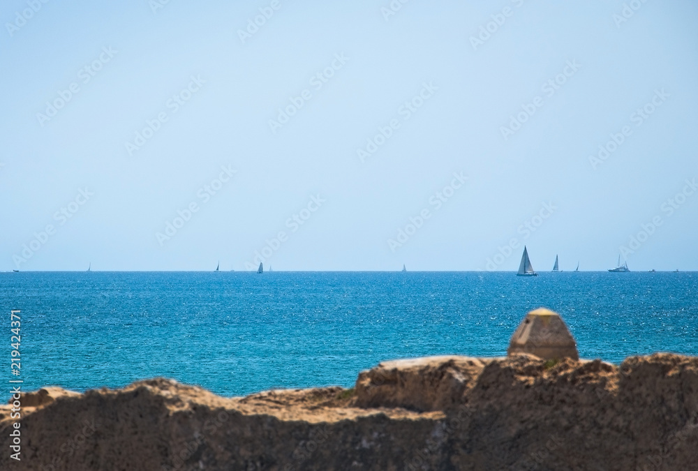 Sailboats on the horizon Mallorca, Spain Sailboats on the horizon Mallorca, Spain