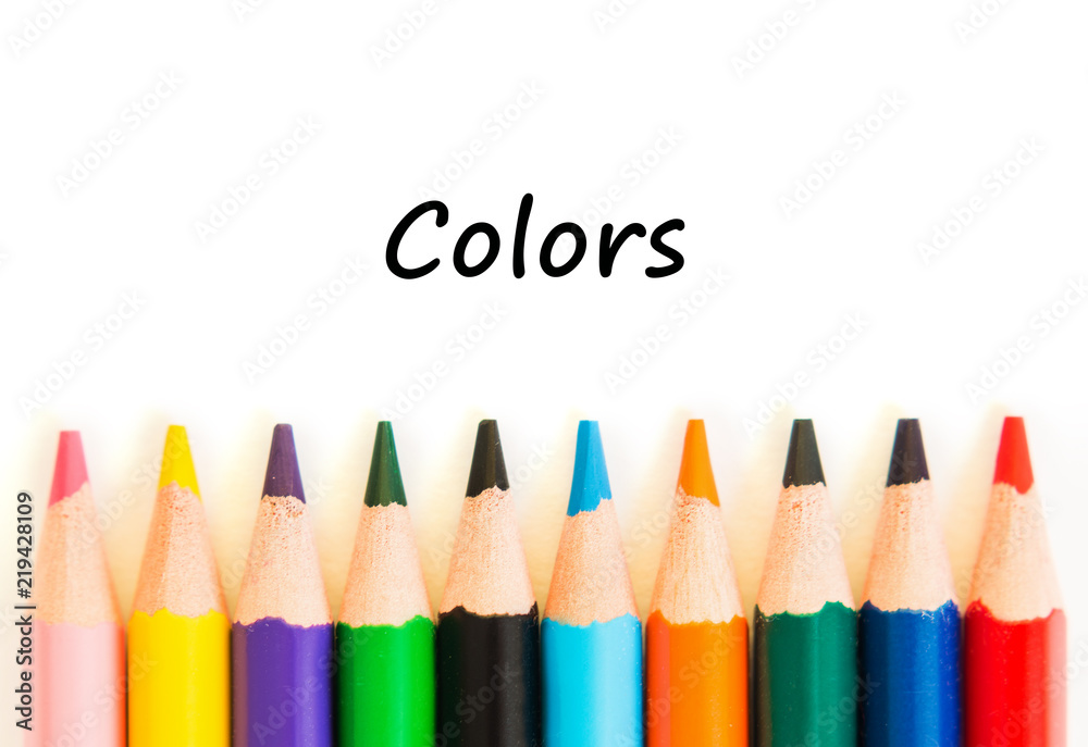 Fototapeta premium Color pencils isolated on white background. Text colors.