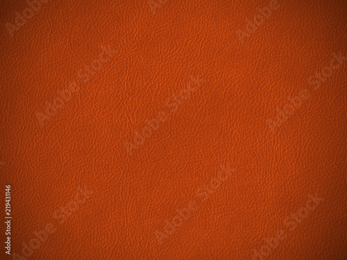 Texture cuir marron grainé vue de dessus à plat avec effet de vignetage sur la photo