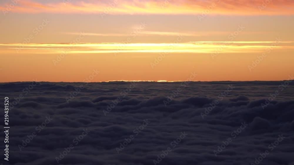 view from the airplane window to the wing, evening, sunset, clouds, concept of night voyages and travels view from the airplane window to the wing, evening, sunset, clouds, concept of night voyages and travels